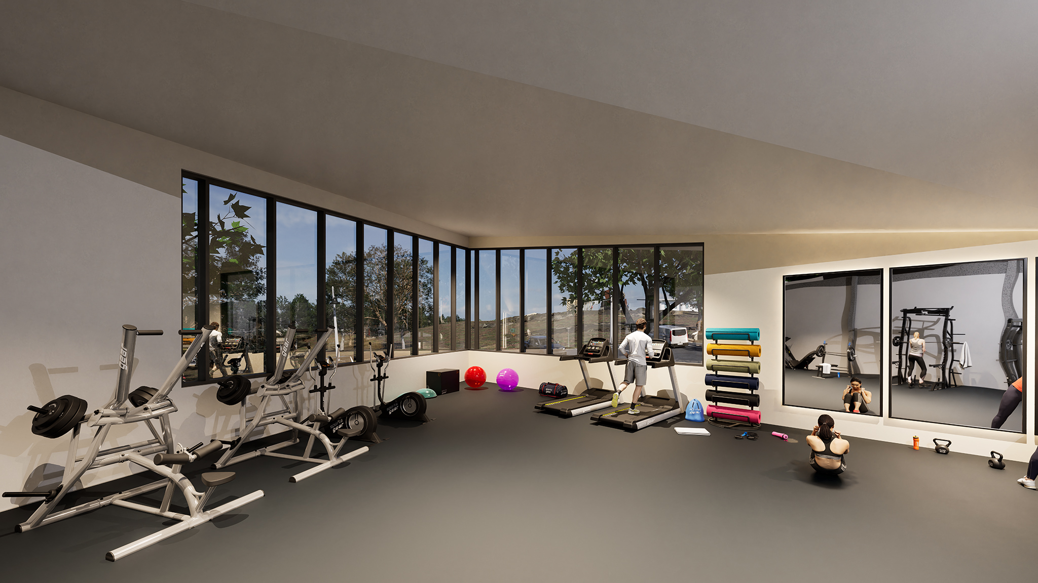 Rendering of the gymnasium of the building, with treadmills, weight lifting machines, yoga mats and big mirrors on the wall. A man runs on the treadmill.